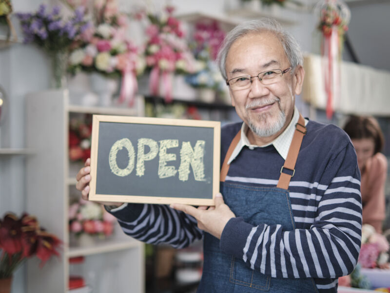 Restaurant owner reviewing finances